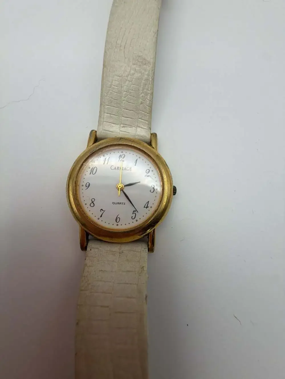 Carriage Quartz Women's Gold-Tone Watch with White Embossed Strap